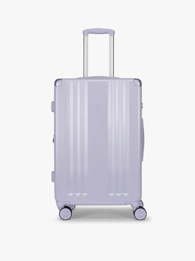 CALPAK Ambeur Medium Luggage in light lavender purple in Sea Glass with handles and spinner wheels on a white background; LAM1024-SEA-GLASS