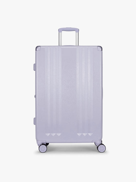 CALPAK Ambeur Large Luggage in light lavender purple with handles and spinner wheels on a white background; LAM1028-SEA-GLASS