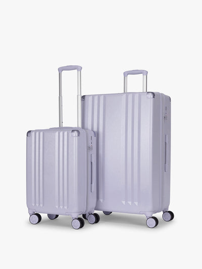 CALPAK Two Piece Amber Luggage Set with Carry On and Large size in light purple lavender with handles and spinner wheels on a white background; LAM2000-SEA-GLASS