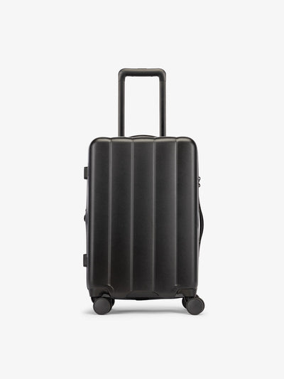 CALPAKs Black carry-on luggage made from an ultra-durable polycarbonate shell and expandable by up to 2"; LCO1020-BLACK