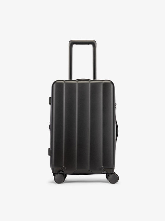 CALPAKs Black carry-on luggage made from an ultra-durable polycarbonate shell and expandable by up to 2"; LCO1020-BLACK