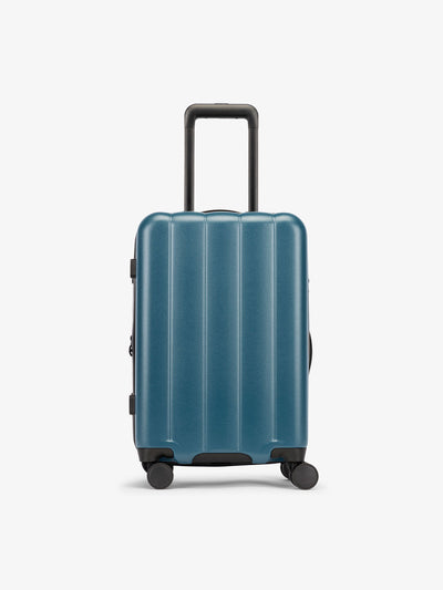 CALPAK Pacific blue carry-on luggage made from an ultra-durable polycarbonate shell and expandable by up to 2"; LCO1020-PACIFIC
