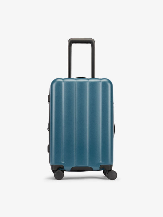 CALPAK Pacific blue carry-on luggage made from an ultra-durable polycarbonate shell and expandable by up to 2"; LCO1020-PACIFIC