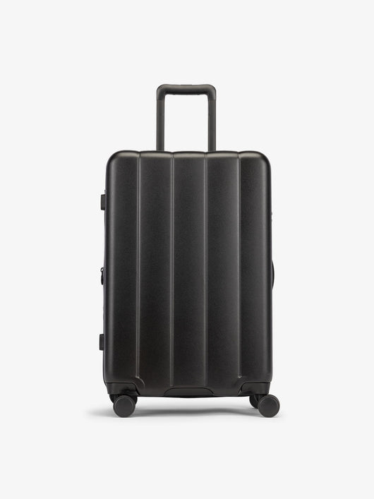 CALPAK Black medium luggage made from an ultra-durable polycarbonate shell and expandable by up to 2"; LCO1024-BLACK