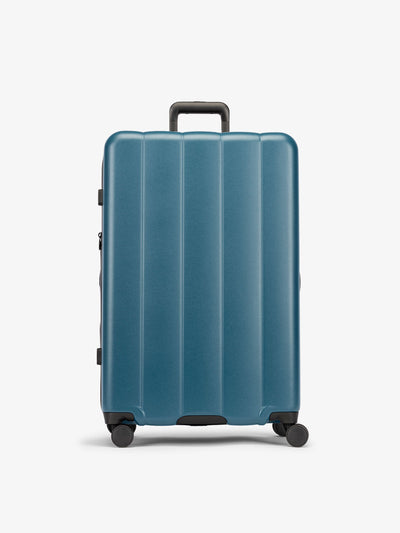 CALPAK Pacific blue large luggage made from an ultra-durable polycarbonate shell and expandable by up to 2"; LCO1028-PACIFIC