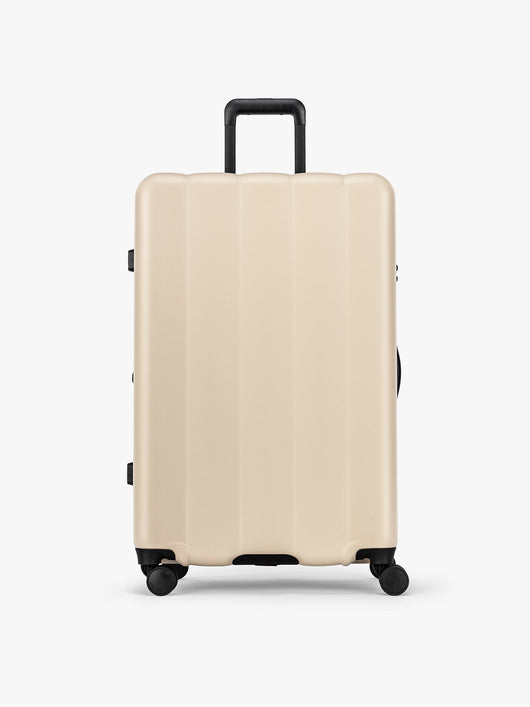 CALPAK Evry Large Luggage in beige exterior and interior polka dot in Polka Dot; LCO1028-POLKA-DOT