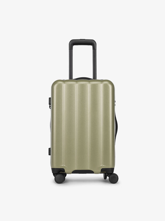 Pistachio green CALPAK carry-on luggage made from an ultra-durable polycarbonate shell and expandable by up to 2"; LCO1020-PISTACHIO