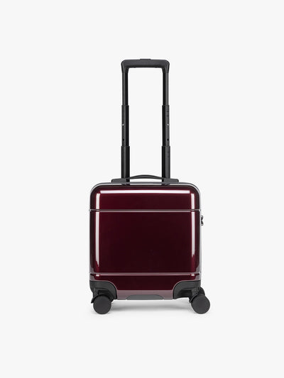CALPAK Glazed Dark Cherry Hue Mini Carry On Red suitcase with a black handle on a white background; LHU1014-GLAZED-DARK-CHERRY