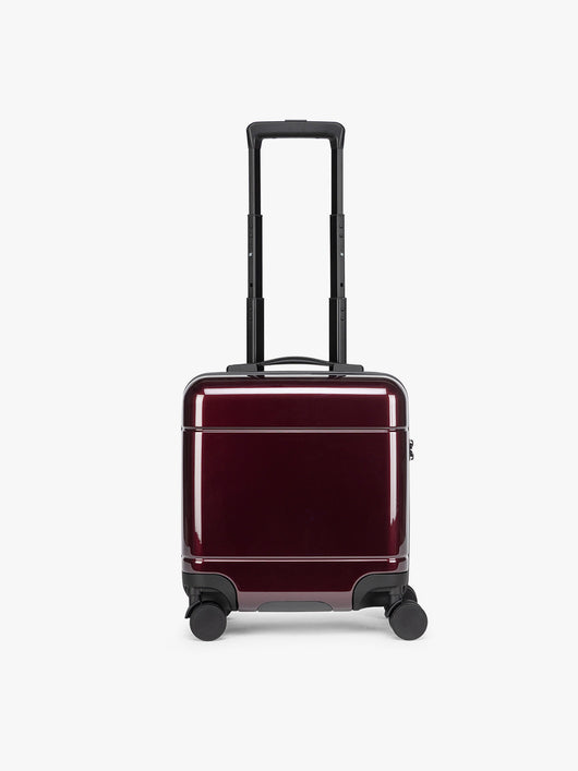 CALPAK Glazed Dark Cherry Hue Mini Carry On Red suitcase with a black handle on a white background; LHU1014-GLAZED-DARK-CHERRY