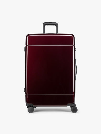 CALPAK maroon Hue Large Luggage in Glazed Dark Cherry; LHU1028-GLAZED-DARK-CHERRY