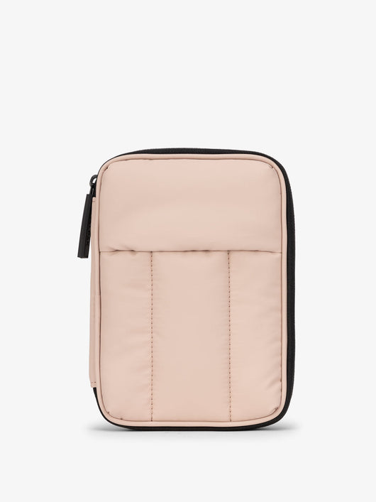 CALPAK Luka Zippered Passport Wallet with soft, puffy exterior in rose quartz; PZW2301-ROSE-QUARTZ