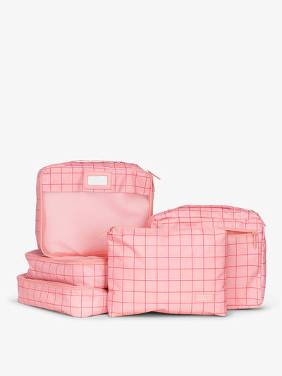 CALPAK 5 piece set packing cubes for travel with labels and top handles in pink grid; PC1601-PINK-GRID