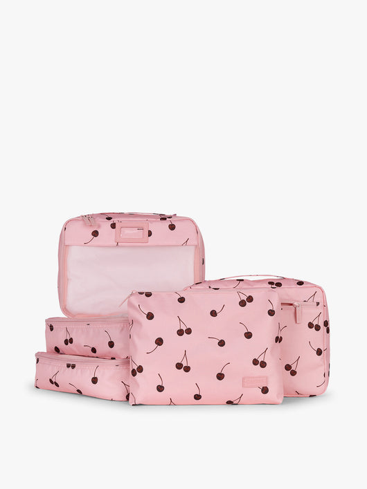 CALPAK Packing Cubes 5pc Set in pink with cherry print in Blossom Cherry on a white background; PC1601-BLOSSOM-CHERRY