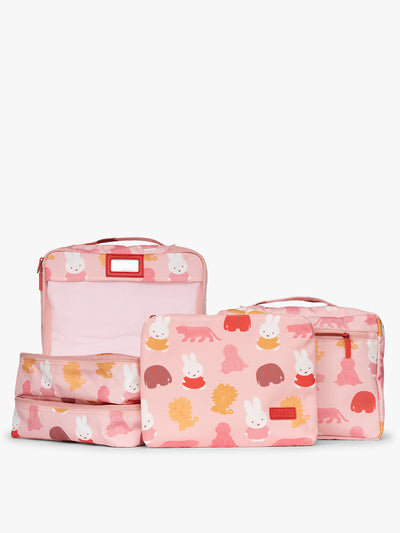 Set of CALPAK Packing Cubes in colorful pink pouches with Miffy and animal pattern on a white background; PC1601-MIFFY-PINK-ZOO-TRIP