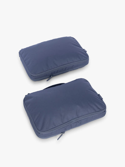 CALPAK Medium Compression Packing Cubes (Set of 2) compressed in dark blue Indigo; PCC2201-INDIGO