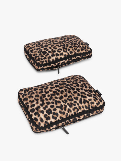 Two tan and black animal print Leopard CALPAK Medium Compression Packing Cubes with zippers shown on a clean white background; PCC2201-LEOPARD