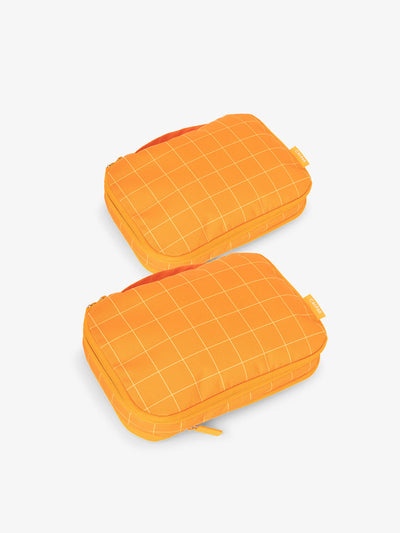 CALPAK small compression packing cubes in orange grid; PCS2301-ORANGE-GRID