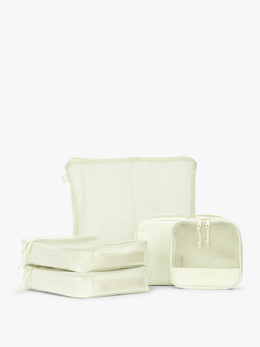 CALPAK Terra 5-Piece Packing Cube Set in light green Celadon with two small cubes, two medium cubes, and one large mesh cube with zippers and mesh; PCT2601-CELADON
