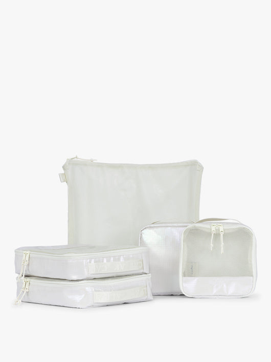 CALPAK Terra 5-Piece Packing Cube Set in shiny white iridescent Moonbeam with two small cubes, two medium cubes, and one large mesh cube with zippers and mesh; PCT2601-MOONBEAM