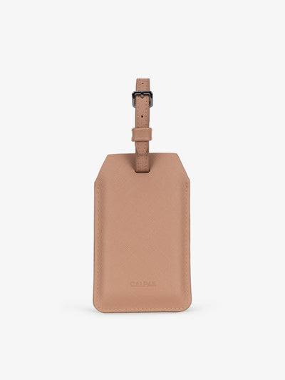 CALPAK Portable Luggage Tag + Charger with faux leather exterior in  brown; APT2401-CARAMEL