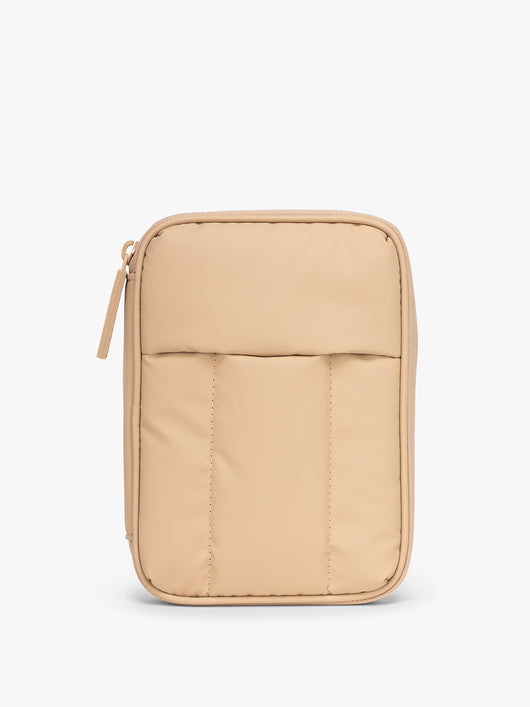 CALPAK Luka Zip Passport Wallet in beige Latte on a white background; PZW2301-LATTE