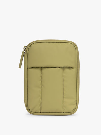CALPAK Luka Zip Passport Wallet in dark green Pistachio on a white background; PZW2301-PISTACHIO