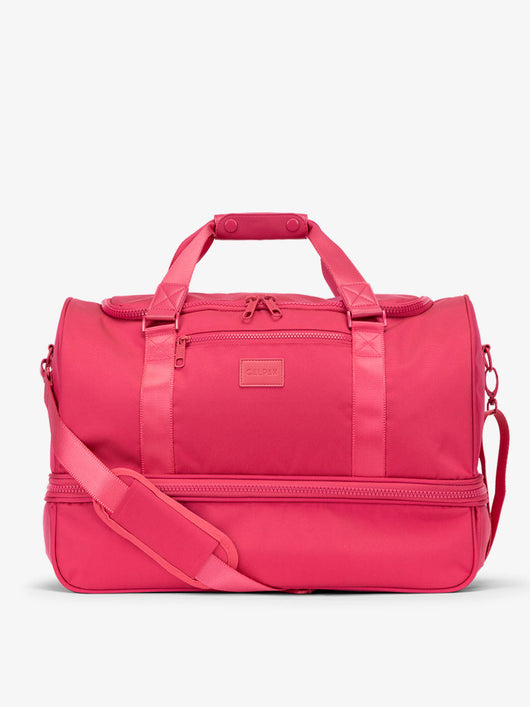 CALPAK Stevyn Duffel bag with removable crossbody strap in pink dragonfruit; DST7019-DRAGONFRUIT