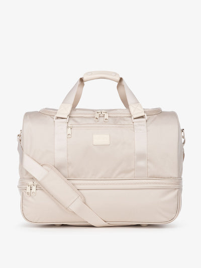 CALPAK Stevyn duffel bag in cream dune; DST7019-DUNE
