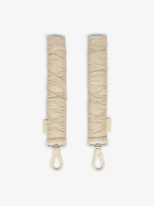 CALPAK Stroller Straps for Diaper Bag made with Oeko-Tex certified, recycled, and water-resistant materials in oatmeal; STP2401-OATMEAL