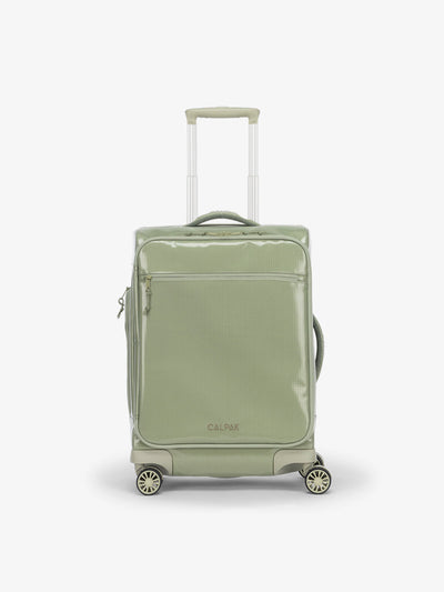Studio product shot of back-facing CALPAK Terra 35L Carry-On luggage with soft shell and 360 spinner wheels in juniper; LTR1020-JUNIPER