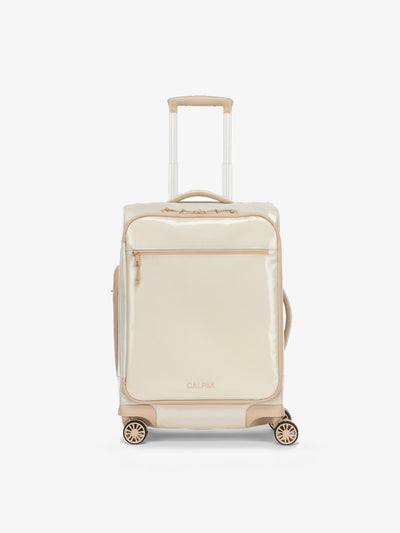 Studio product shot of front-facing CALPAK Terra 35L Carry-On luggage with soft shell and 360 spinner wheels in white sands beige; LTR1020-WHITE-SANDS