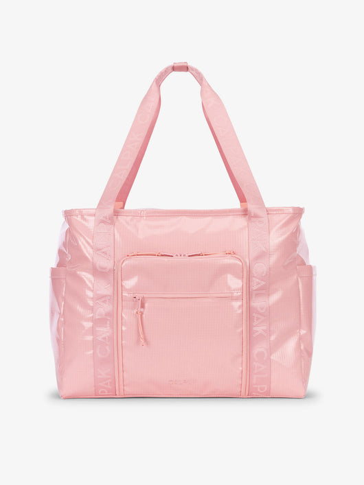 CALPAK Terra 35L Water Resistant Zippered Tote Bag made with durable recycled ripstop exterior, nylon webbing tote straps and multiple exterior pockets in blossom; TTO2401-BLOSSOM
