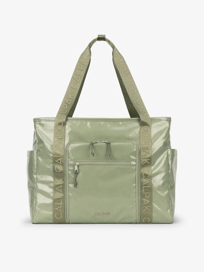 CALPAK Terra 35L Water Resistant Zippered Tote Bag made with durable recycled ripstop exterior, nylon webbing tote straps and multiple exterior pockets in juniper; TTO2401-JUNIPER