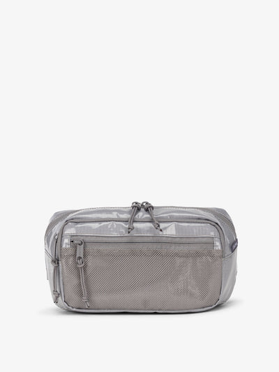 CALPAK Terra small sling bag with mesh front pocket in gray storm; BBT2301-STORM