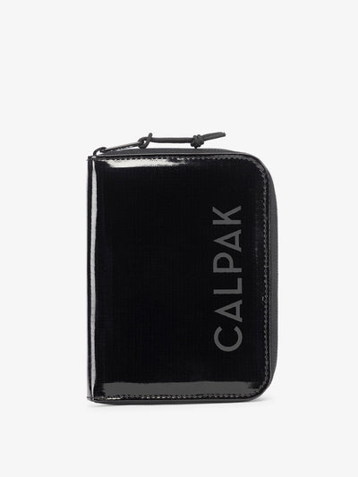 CALPAK Terra Zippered Passport Wallet in Obsidian black front view; ATPW2501-OBSIDIAN