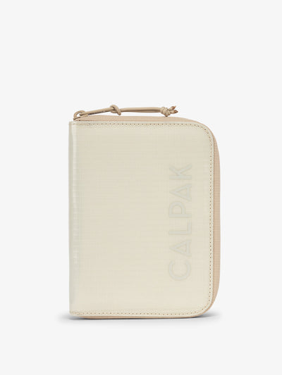 CALPAK Terra Zippered Passport Wallet in beige White Sands front view; ATPW2501-WHITE-SANDS