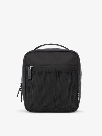 Front-view of CALPAK The Everything Cube made with durable exterior material featuring exterior mesh pocket and top handle in black; ACE2401-BLACK
