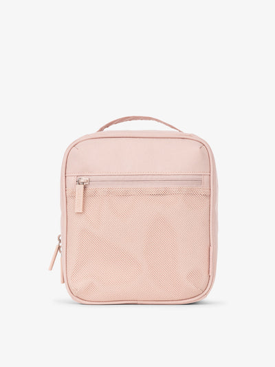 Front-view of CALPAK The Everything Cube made with durable exterior material featuring exterior mesh pocket and top handle in pink sand; ACE2401-PINK-SAND