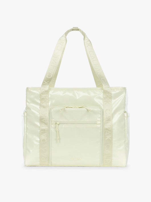 CALPAK Terra 35L Tote Bag with multiple pockets and shoulder straps in shiny light green Celadon on a white background; TTO2401-CELADON