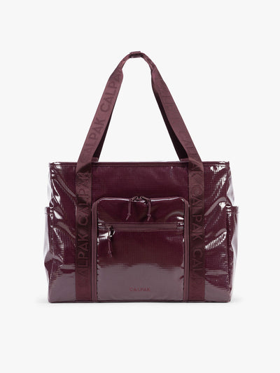 CALPAK Terra 35L Tote Bag with zippers in dark red Dark Cherry on a white background; TTO2401-DARK-CHERRY
