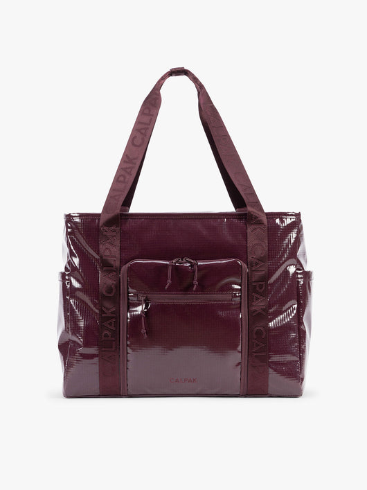 CALPAK Terra 35L Tote Bag with zippers in dark red Dark Cherry on a white background; TTO2401-DARK-CHERRY