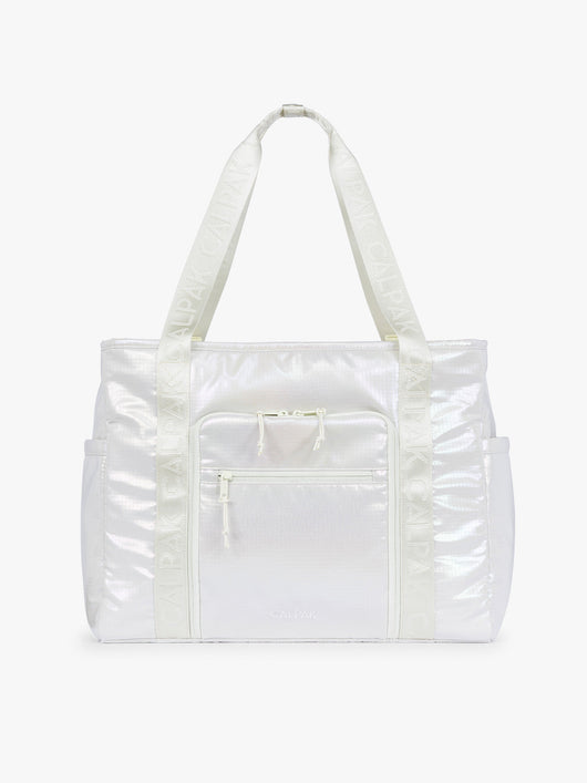 CALPAK Terra 35L Tote Bag with multiple pockets and shoulder straps in shiny white Moonbeam on a white background; TTO2401-MOONBEAM